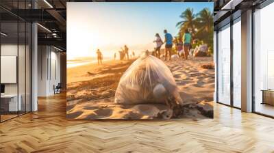 A group of people are walking on a beach, picking up and cleaning the trash and plastic waste Wall mural