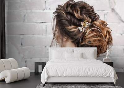 attractive young brunette woman with beautiful hairstyle with hair detail accessory, closeup rear view Wall mural