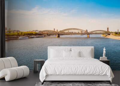 Great Panoramic view of the city of Koln, the Rhine River, bridges and various ferries and ships at the pier. Wall mural