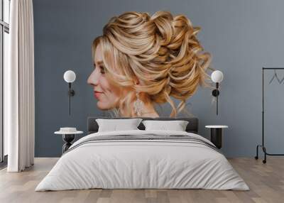 Model blonde Woman with perfect hairstyle and creative hair-dress, back view Wall mural