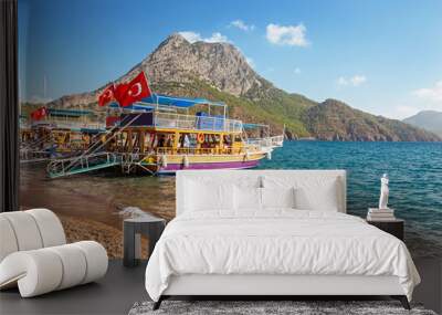 Panoramic view of the coastal beach with cruise ships with turkish flags waiting for tourists Wall mural