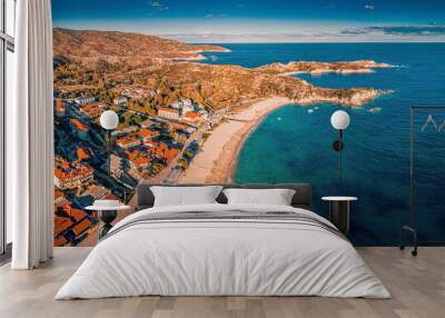 Visit Kalamitsi beach in Greece. Aerial view of the idyllic seascape on the Sithonia peninsula in Halkidiki. High above the roofs of the resort village with villas and hotels. Wall mural