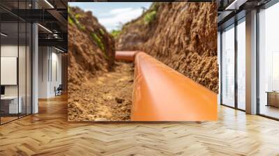 Plastic pipes in the ground during the construction of a building, bunner with copy space Wall mural