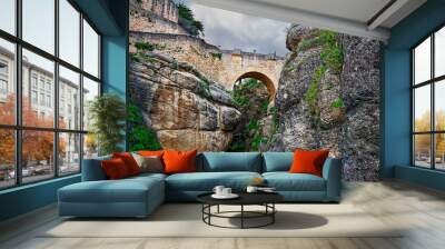 Low angle view of Old Bridge of Ronda, Spain Wall mural