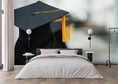 Review of the success university graduate hat during commencement. Concept of successful in education. University congratulation ceremony. Education stock photo. Wall mural