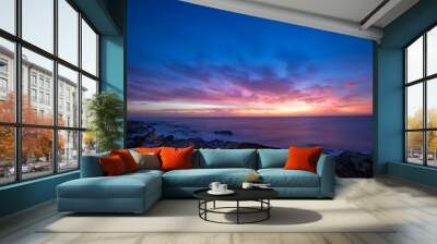 Seascape during sunrise. Beautiful natural seascape, blue hour. Sea sunrise at the Black Sea coast. Wall mural