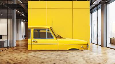 Yellow vintage car parked against yellow wall Wall mural