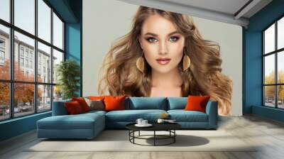 Beautiful model girl with elegant hairstyle and fashionable leaflet earrings . Woman with fashion  hair   and  accessories and jewelry . Wall mural