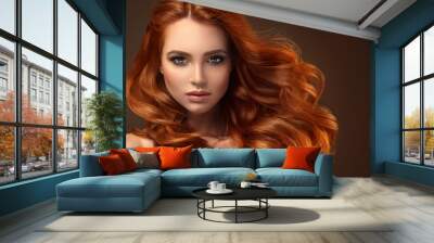 Beautiful model girl with long red curly hair .Red head . Care and beauty hair products   Wall mural