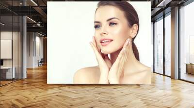 Beautiful young woman with clean fresh skin .Girl beauty face care. Facial treatment . Cosmetology , beauty and spa . 

 Wall mural