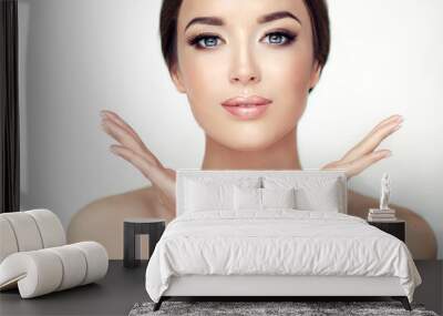 Beautiful Young Woman with Clean Fresh Skin close up . Skin care face . Cosmetology
 Wall mural