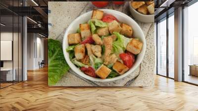 chicken Caesar salad with tomatoes, cheese and croutons. North American cuisine Wall mural