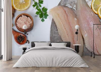 Fresh Pangasius dory Fish Fillet with ingredient on white background Wall mural