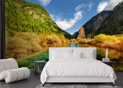 Amazing sunny landscape with azure river among mountains Wall mural