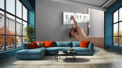 turning on or off on grey light switch. Wall mural