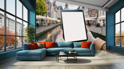 Tablet held by Woman in Outside - Mockup for Application or Web Design - Template for Presentation of Graphic Design - Corporate Representation at Consumers Wall mural