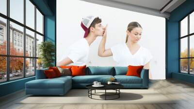 Displeased teenager girl rejecting kiss or relationship. Halitosis concept Wall mural