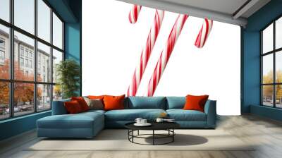 Two red and white striped candy canes Wall mural