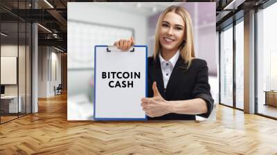 Business, technology, internet and network concept. Young businessman thinks over the steps for successful growth: Bitcoin cash Wall mural