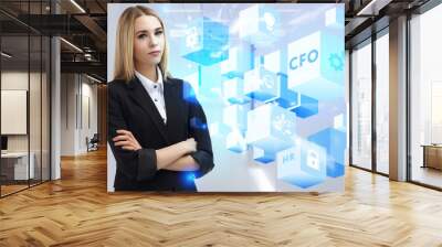 Business, Technology, Internet and network concept. Young businessman working on a virtual screen of the future and sees the inscription: CFO Wall mural