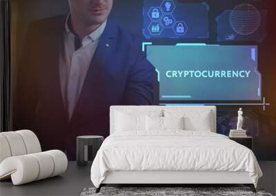 Business, Technology, Internet and network concept. Young businessman working on a virtual screen of the future and sees the inscription: Cryptocurrency Wall mural