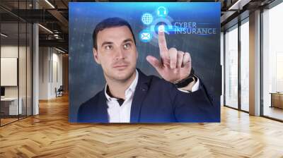 Business, Technology, Internet and network concept. Young businessman working on a virtual screen of the future and sees the inscription: Cyber insurance Wall mural