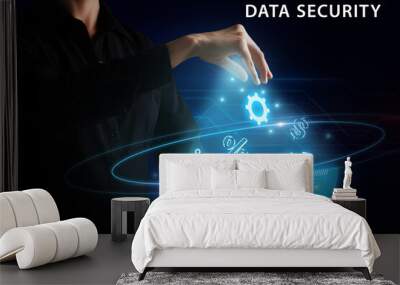 Business, Technology, Internet and network concept. Young businessman working on a virtual screen of the future and sees the inscription: Data security Wall mural