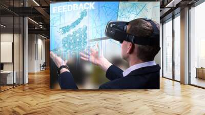 Business, Technology, Internet and network concept. Young businessman working on a virtual screen of the future and sees the inscription: Feedback Wall mural