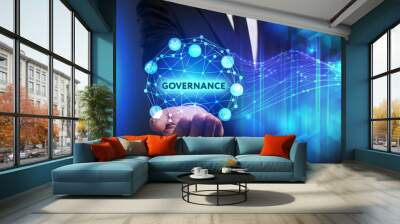 Business, Technology, Internet and network concept. Young businessman working on a virtual screen of the future and sees the inscription: Governance Wall mural