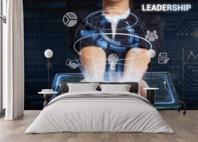 Business, Technology, Internet and network concept. Young businessman working on a virtual screen of the future and sees the inscription: Leadership Wall mural