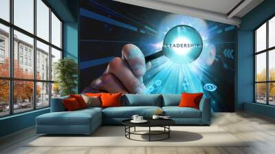 Business, Technology, Internet and network concept. Young businessman working on a virtual screen of the future and sees the inscription: Leadership Wall mural