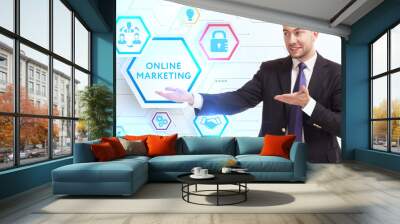 Business, Technology, Internet and network concept. Young businessman working on a virtual screen of the future and sees the inscription: Online marketing Wall mural