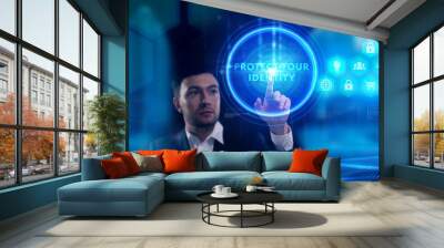 Business, Technology, Internet and network concept. Young businessman working on a virtual screen of the future and sees the inscription: Protect your identity Wall mural