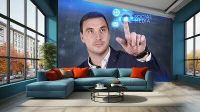 Business, Technology, Internet and network concept. Young businessman working on a virtual screen of the future and sees the inscription: Social media Wall mural