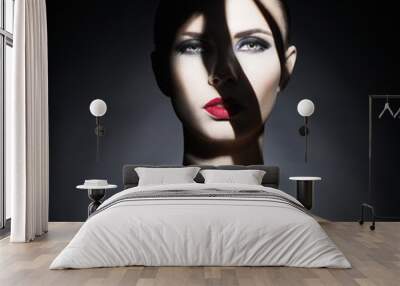 Surrealistic young lady with shadow on her body Wall mural