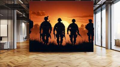 silhouette of a group of people at sunset Wall mural