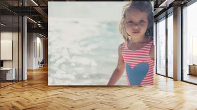 Cute girl at the beach Wall mural