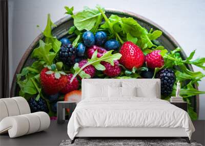 green salad with arugula and berries Wall mural