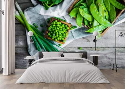 Green vegetables on wooden background Wall mural