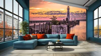 Lighthouse Sunrise. The Wawatam Lighthouse in St. Ignace, Michigan as sun rises over Lake Huron. Wall mural