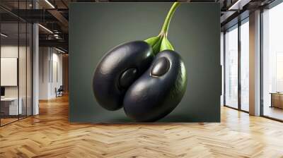 A close up of two black beans. connected by a green stem. Wall mural