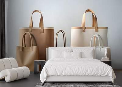 A row of four stylish tote bags in various colors and textures. arranged against a simple backdrop. Wall mural