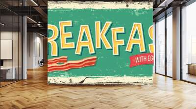 Breakfast with eggs and bacon on an old green metal background. Retro food sign design for a restaurant or a pub. Wall mural