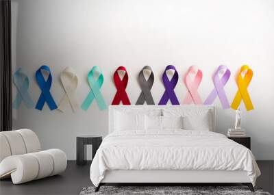 Colorful cancer ribbons as Health symbols for all types of cancer in a row Wall mural