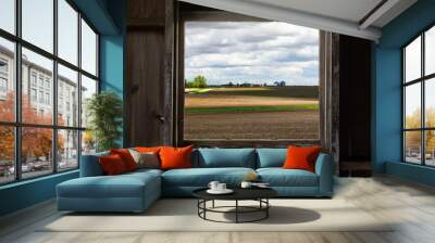 Looking through the old barn window with a view of the open farmland. This morning in Malden, Illinois Wall mural