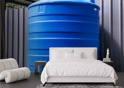 Blue water tank of industrial building. Wall mural