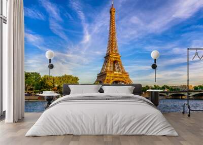 paris eiffel tower and river seine at sunset in paris, france. eiffel tower is one of the most iconi Wall mural