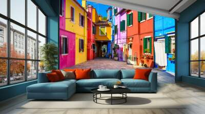 Street with colorful buildings in Burano island, Venice, Italy. Architecture and landmarks of Venice, Venice postcard Wall mural