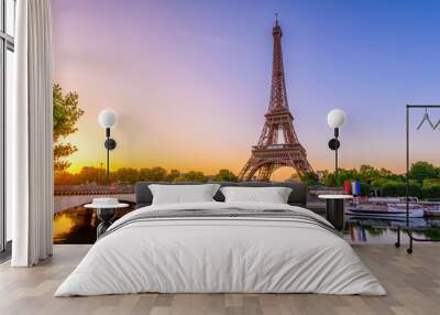 View of Eiffel Tower and river Seine at sunrise in Paris, France. Eiffel Tower is one of the most iconic landmarks of Paris Wall mural