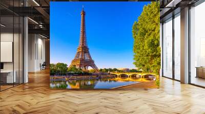 View of Eiffel Tower and river Seine at sunrise in Paris, France. Eiffel Tower is one of the most iconic landmarks of Paris Wall mural